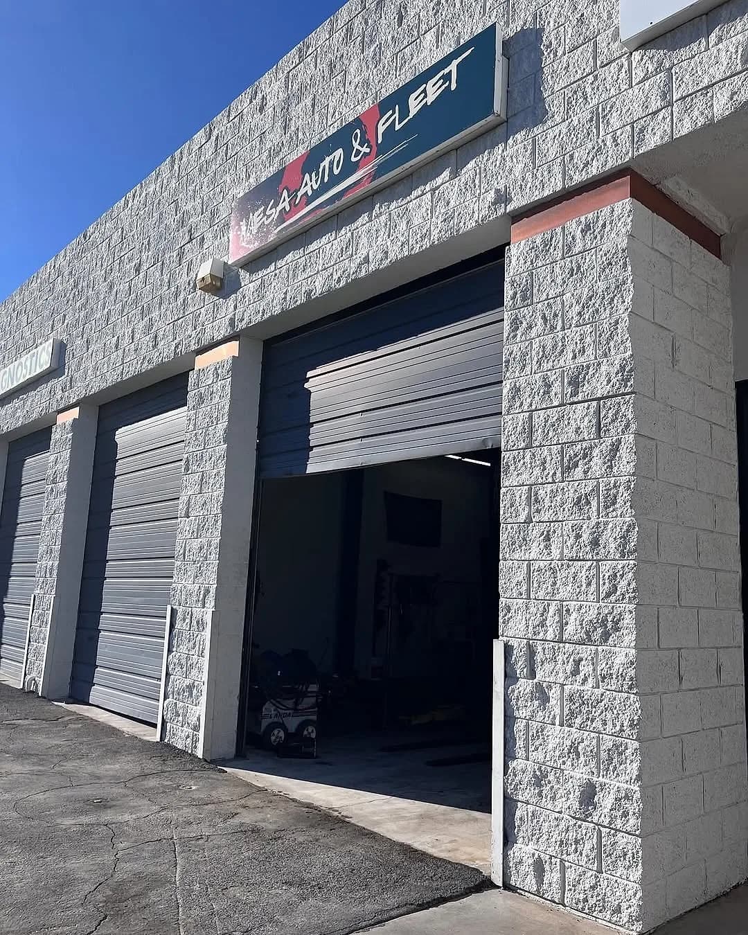 The Mesa Auto & Fleet shop front and bay doors on Baseline Road in Mesa, Arizona