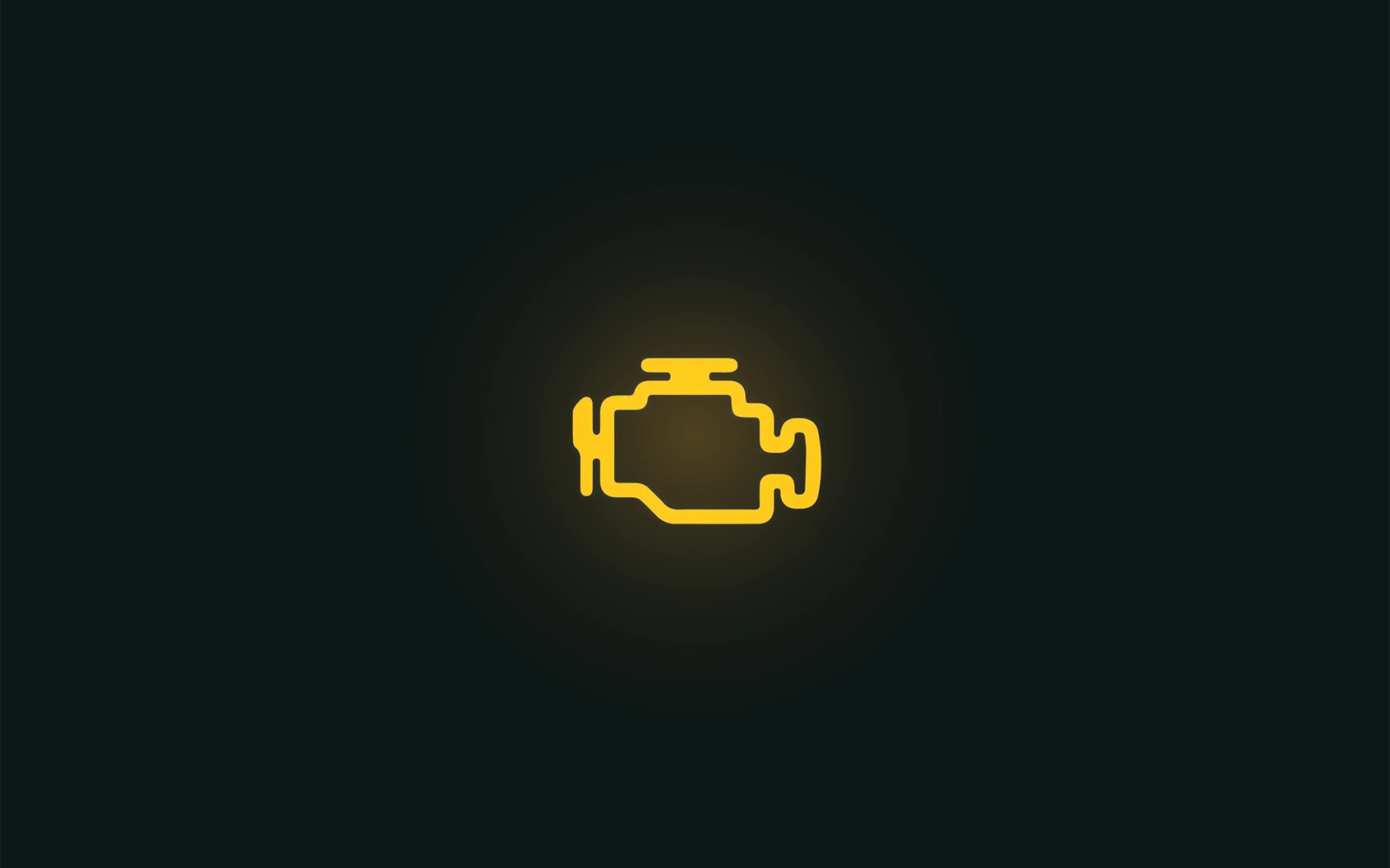 A check engine light glowing amber in a car's instrument cluster